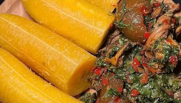 Boiled Plantain with Kpomo Veggies Sauce