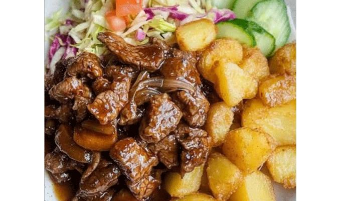 Irish Potatoes, Salad, Goat Meat Sauce or Chicken Sauce
